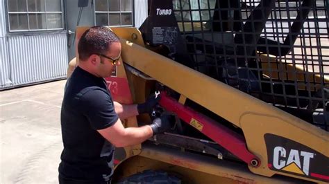 cat 226b skid steer lift arms